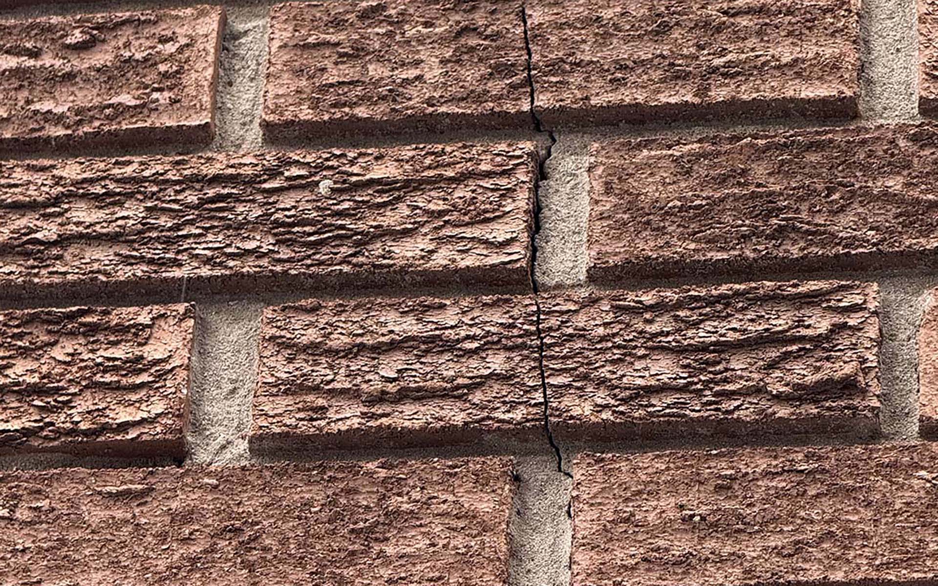 Cracking in masonry wall indicating structural distress