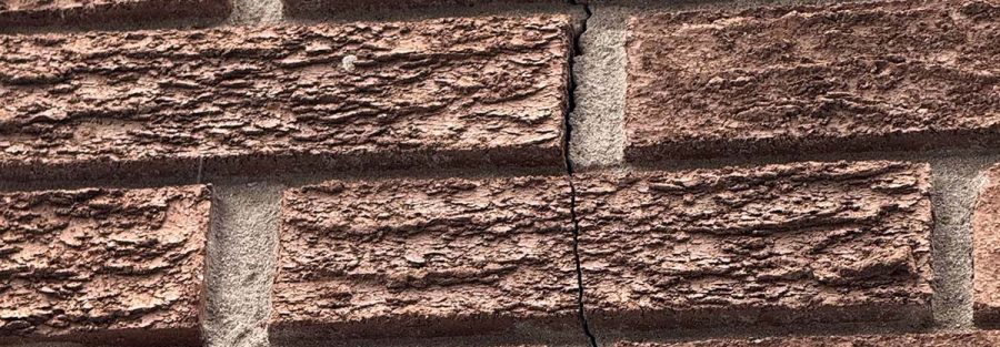 Cracking in masonry wall indicating structural distress