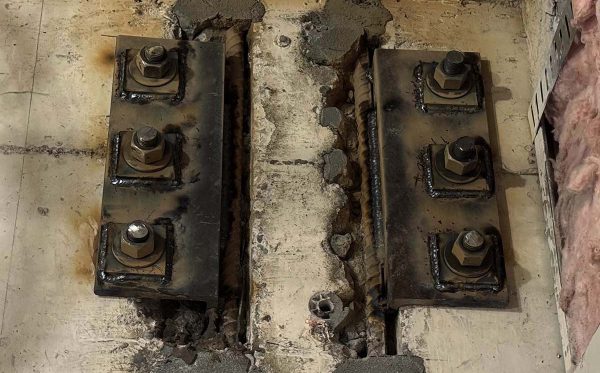 Steel plate repair detail in concrete structure