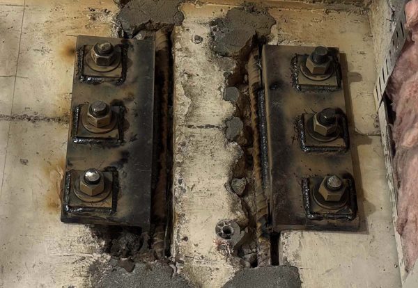 Structural repair and remedial engineering solutions Steel plate repair detail in concrete structure