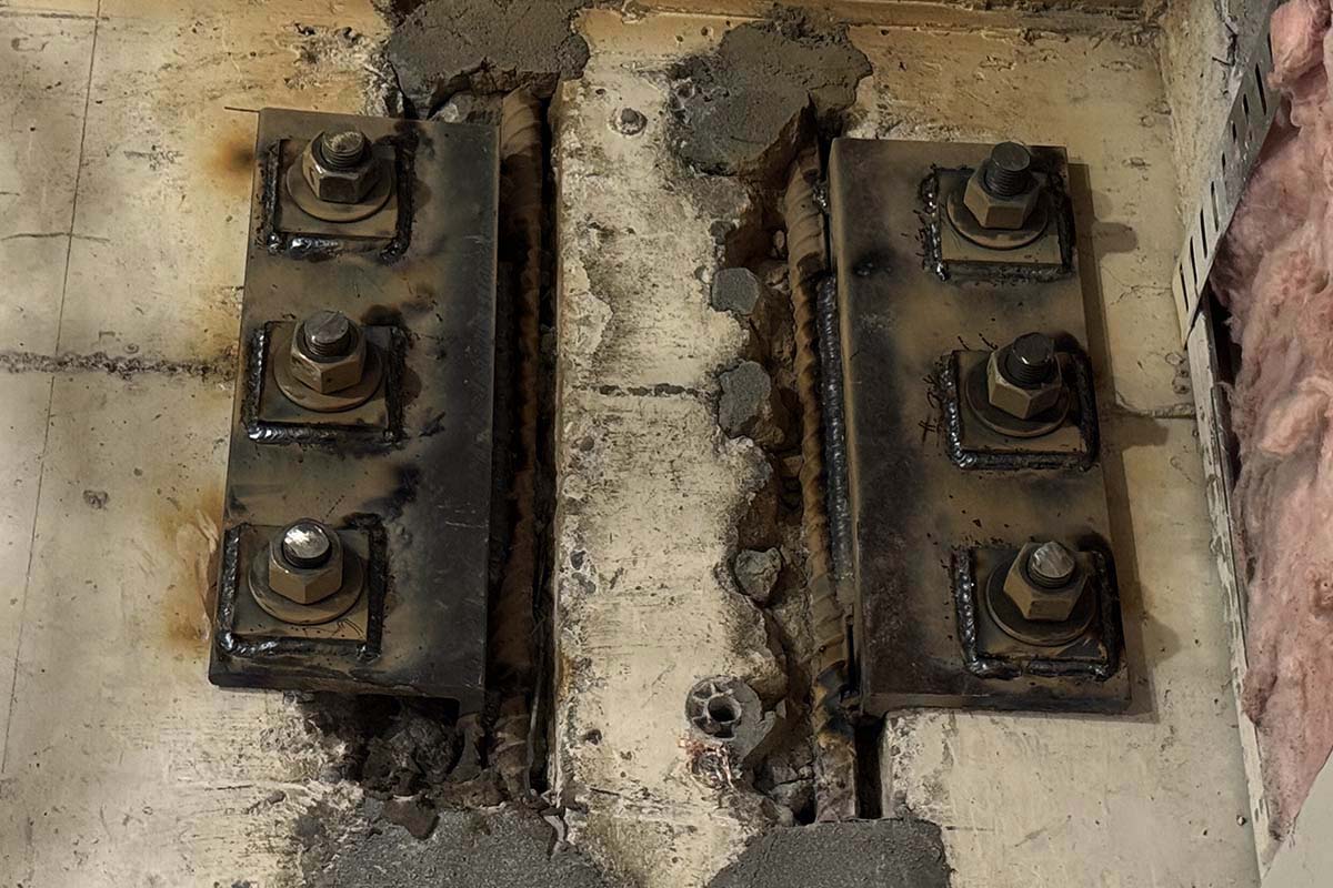 Steel plate repair detail in concrete structure